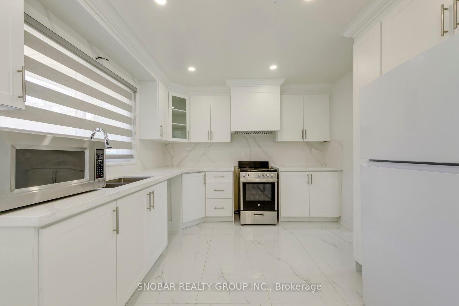 Photo 15 of 99 Jeffcoat Drive, Etobicoke, West Humber-Clairville — HOMEH