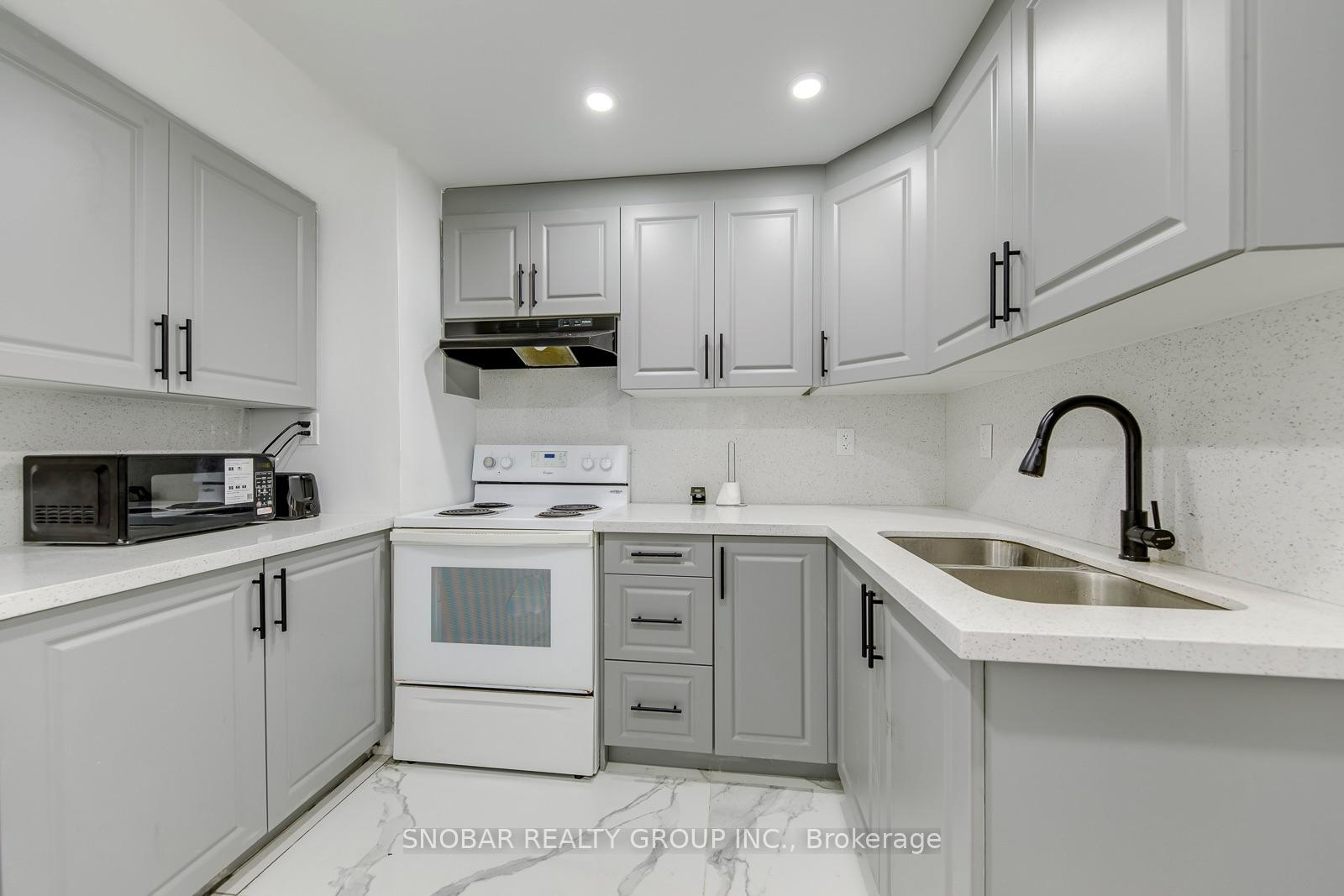 Photo 32 of 99 Jeffcoat Drive, Etobicoke, West Humber-Clairville — HOMEH
