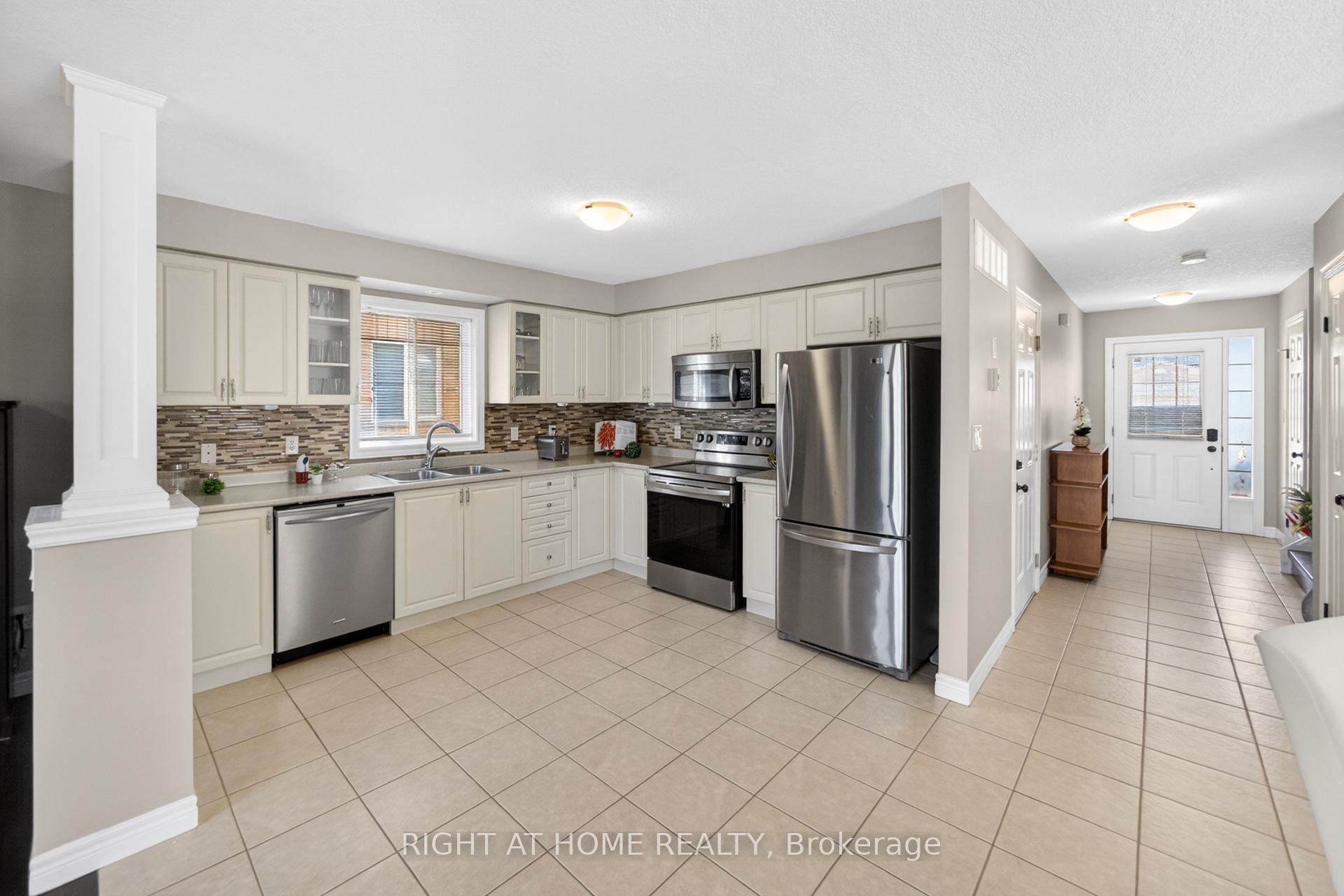 Photo 5 of 21 Mullin Drive, Guelph, Victoria North — HOMEH