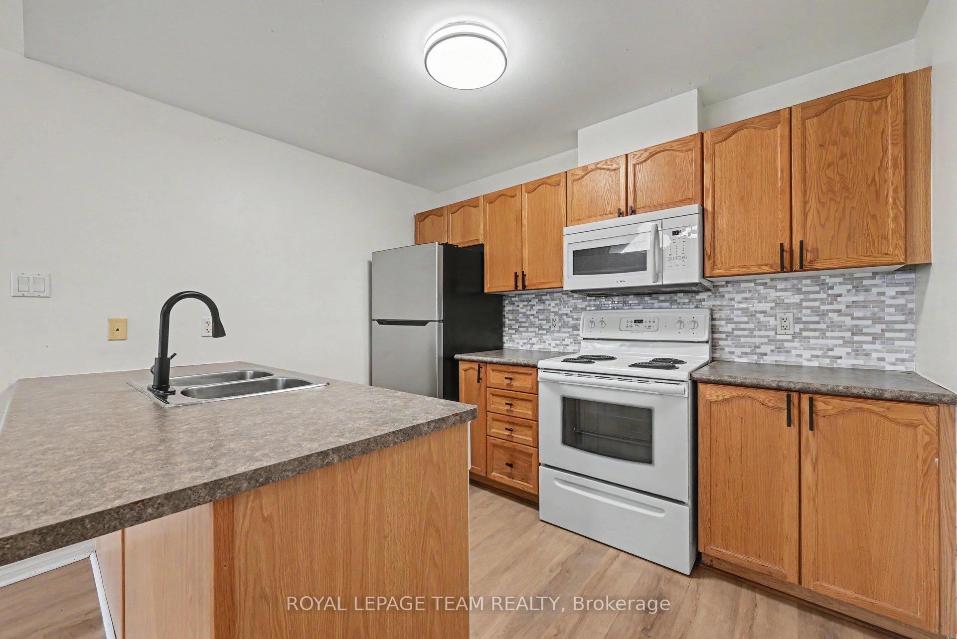 Photo 10 of Unit K, 251 Crestway Drive, Ottawa, Barrhaven East — HOMEH