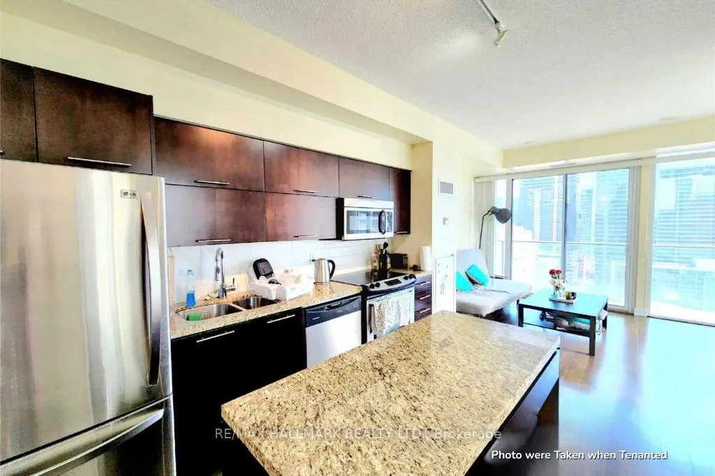 Photo 4 of Unit 2703, 126 Simcoe Street, Toronto, Waterfront Communities — HOMEH