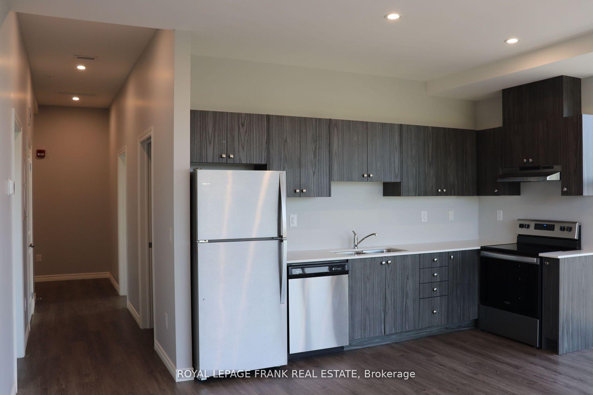 Photo 3 of Unit 413, 513 Dundas Street E, Whitby, Downtown Whitby — HOMEH