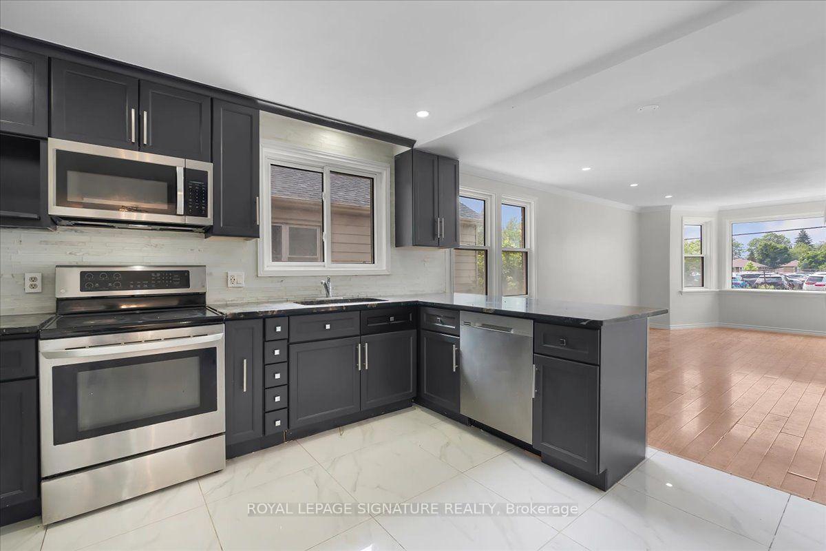 Photo 7 of 195 Park Road S, Oshawa, Vanier — HOMEH