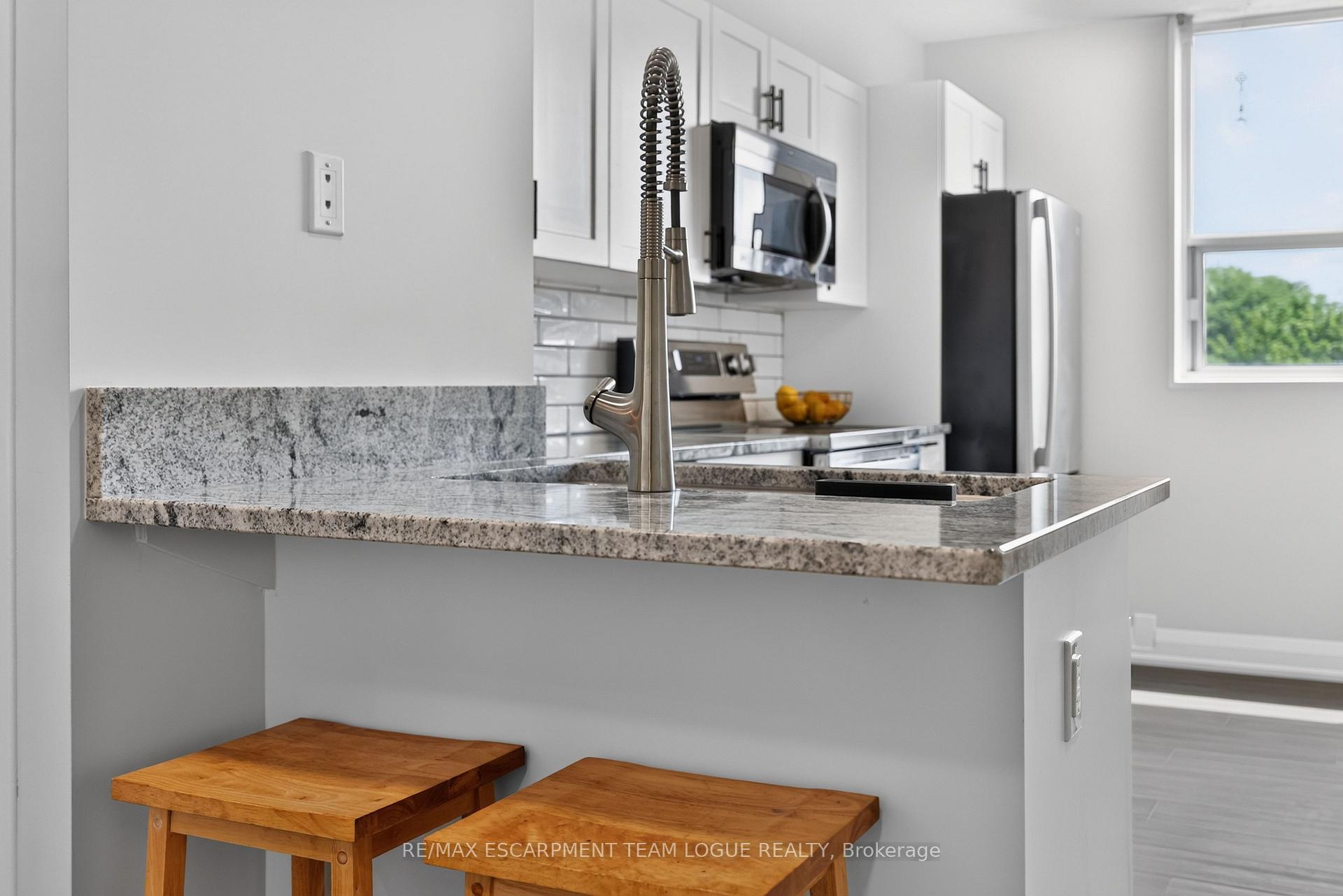 Photo 13 of Unit 401, 700 Dynes Road, Burlington, Roseland — HOMEH