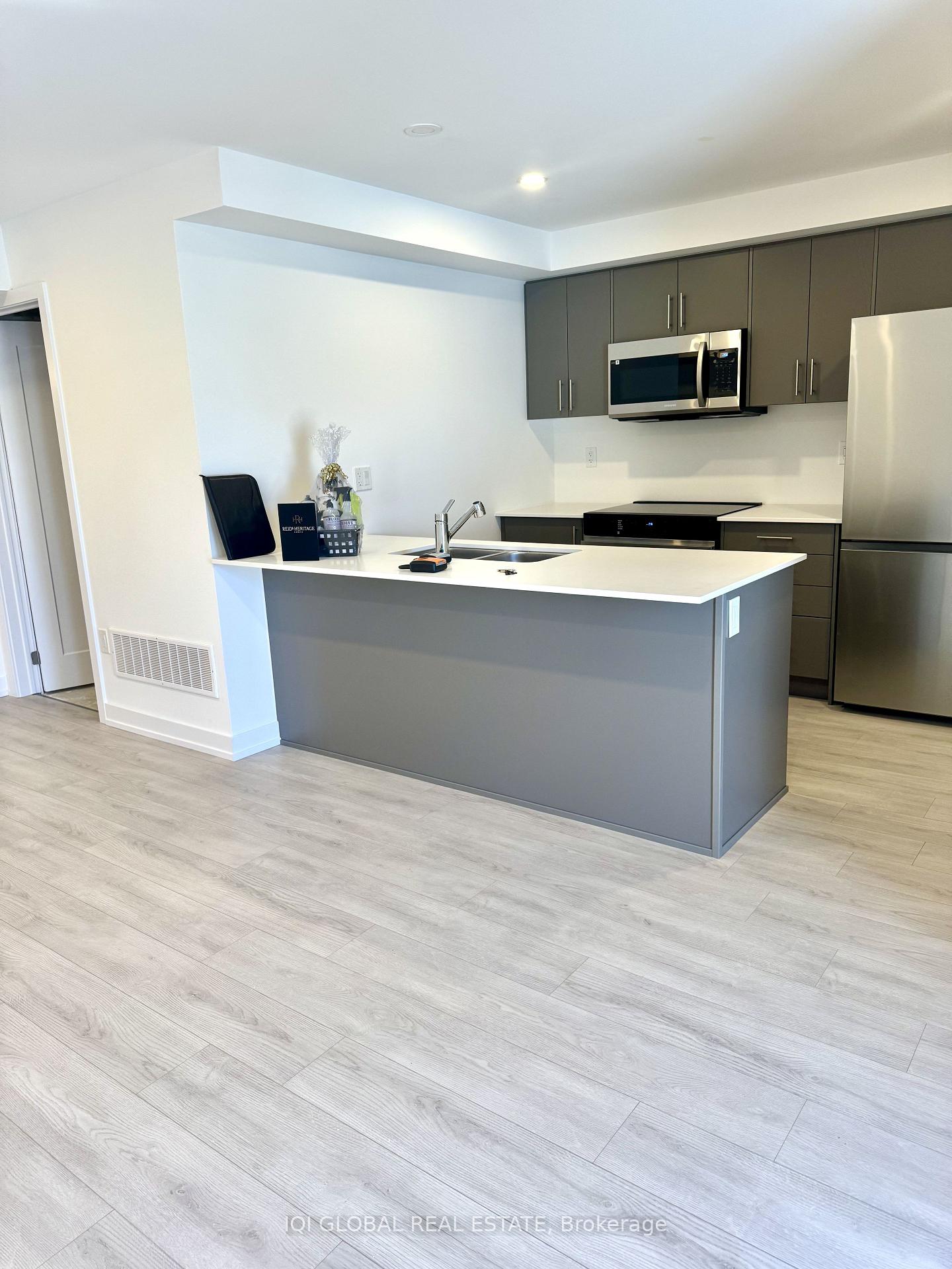 Photo 3 of Unit 123, 42 Lowes Road W, Guelph, Clairfields/Hanlon Business Park — HOMEH