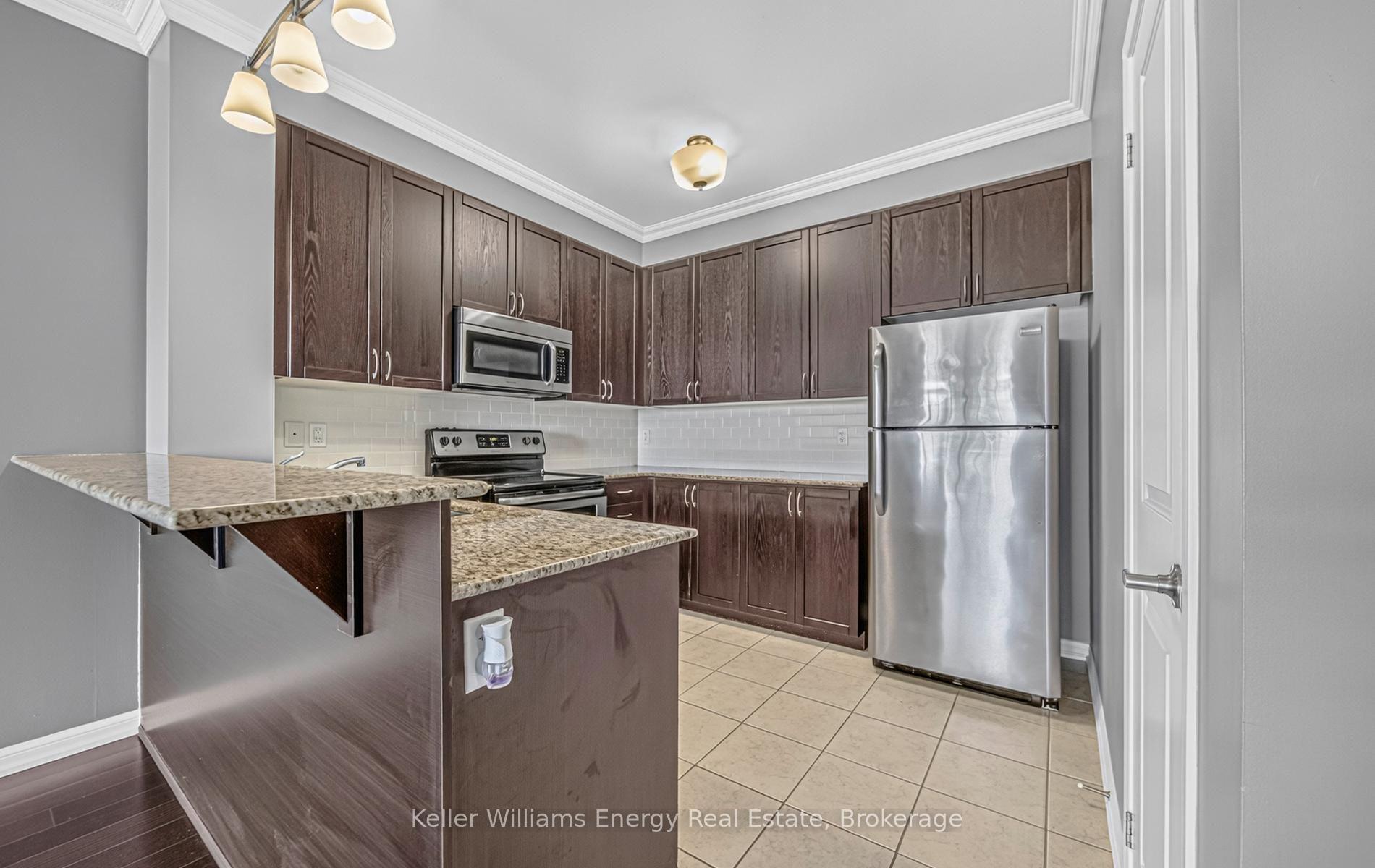Photo 12 of Unit 208, 54 Harvey Johnston Way, Whitby, Brooklin — HOMEH
