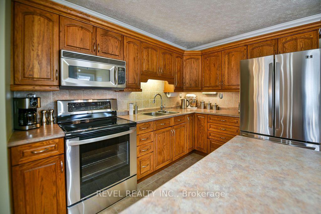 Photo 8 of 532 Lamminen Avenue, Timmins, TNW - Riverpark — HOMEH
