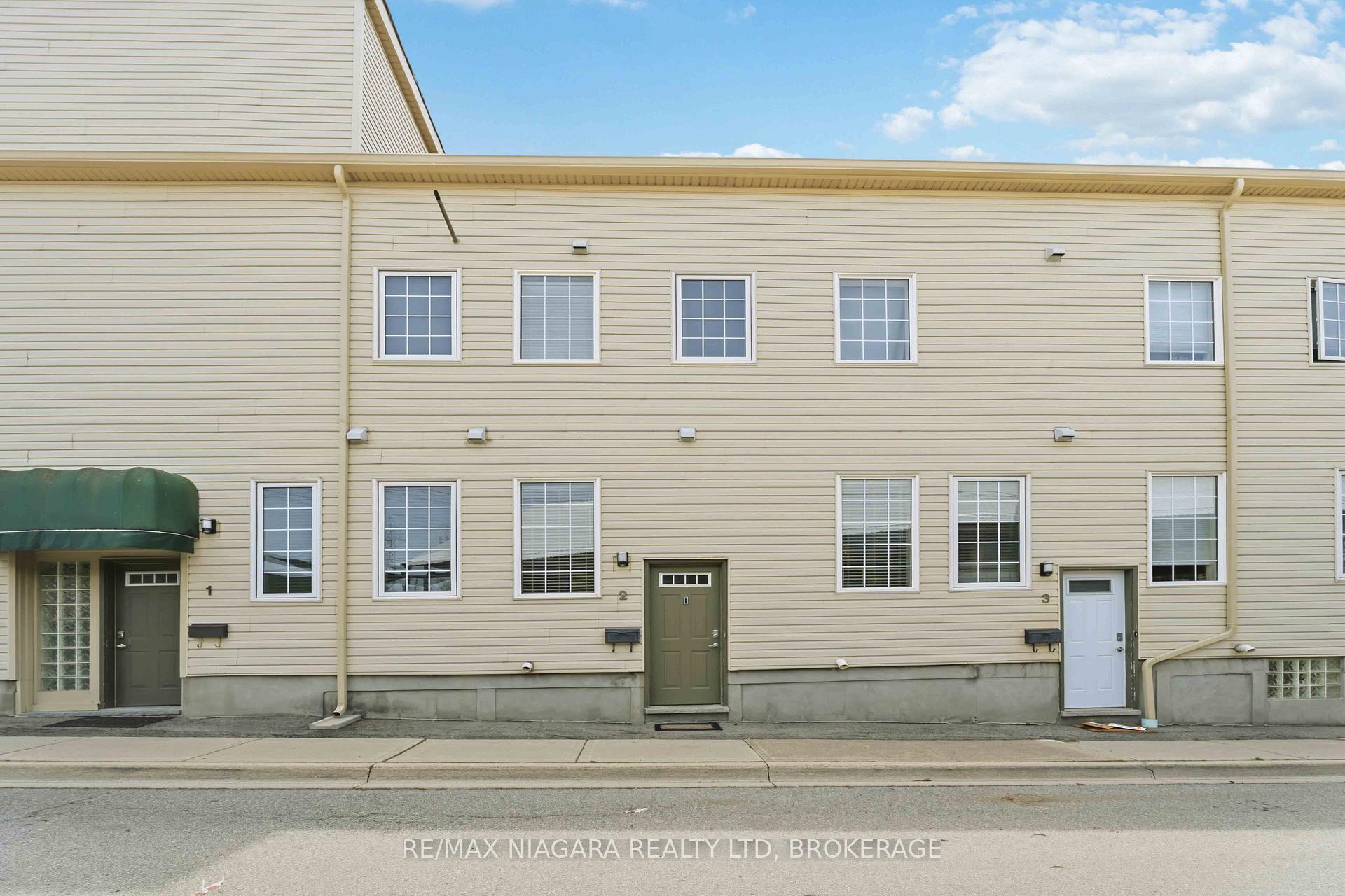 Photo 3 of Unit 2, 49 Ontario Street, Grimsby, Grimsby East — HOMEH