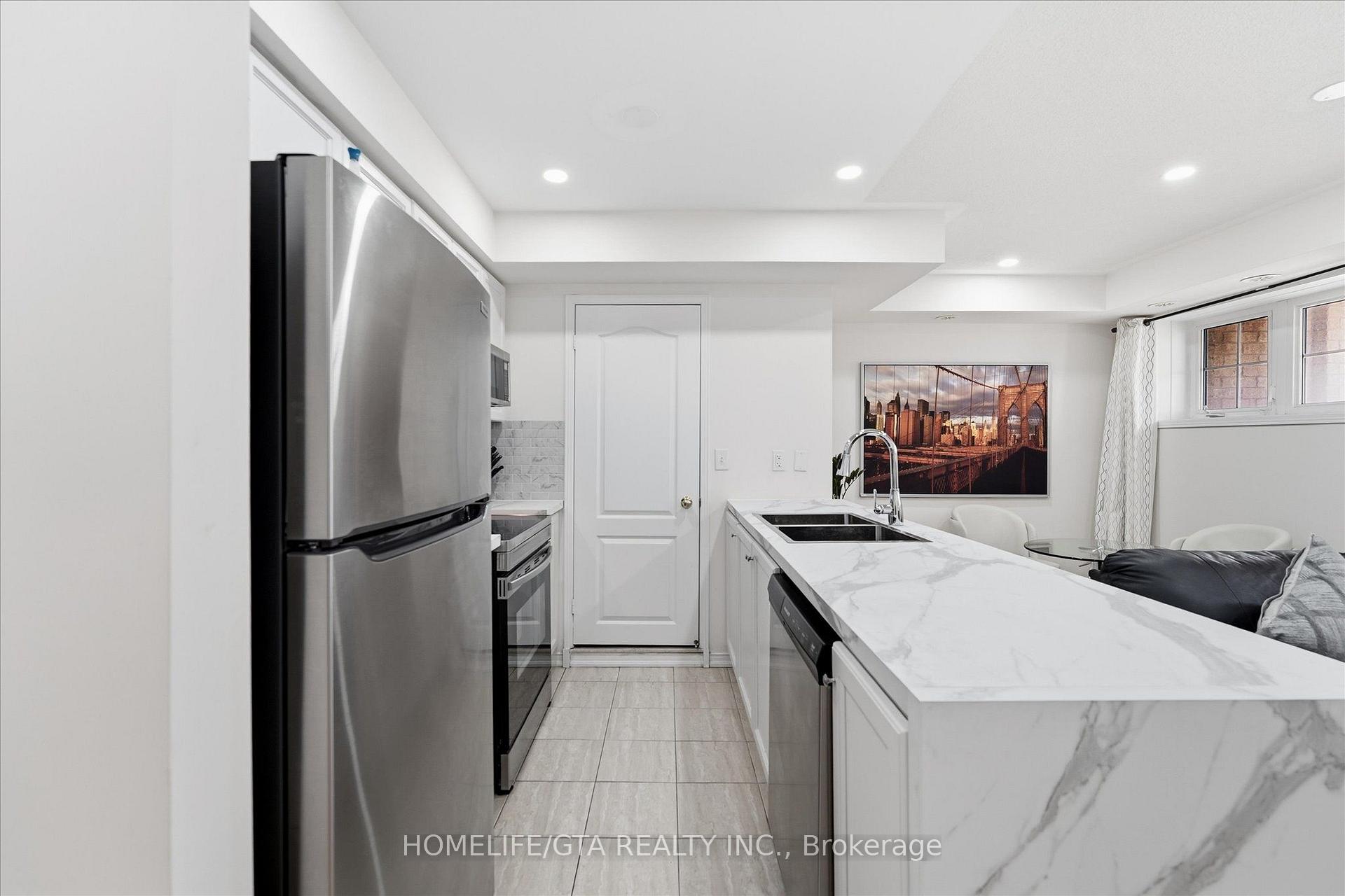 Photo 3 of Unit 3, 157 Isaac Devins Boulevard, North York, Humberlea-Pelmo Park — HOMEH