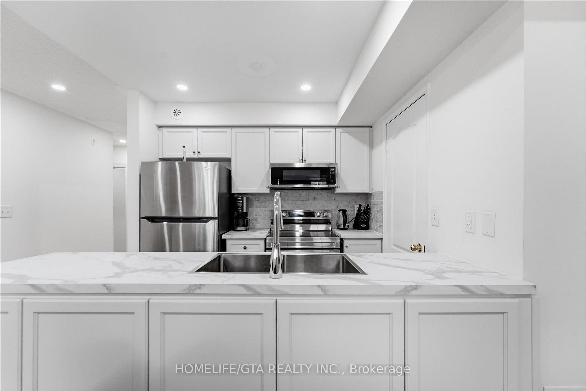 Photo 16 of Unit 3, 157 Isaac Devins Boulevard, North York, Humberlea-Pelmo Park — HOMEH