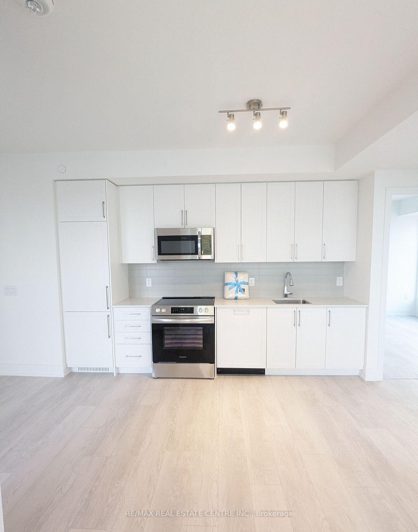 Photo 3 of Unit 409, 2450 Old Bronte Road, Oakville, Westmount — HOMEH
