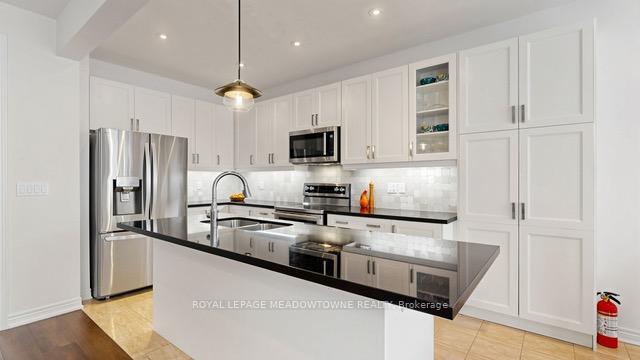Photo 7 of 126 Bridlewood Boulevard, Whitby, Rolling Acres — HOMEH