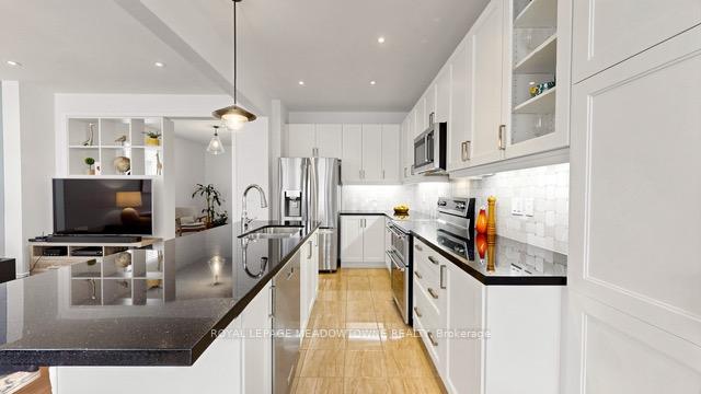 Photo 8 of 126 Bridlewood Boulevard, Whitby, Rolling Acres — HOMEH