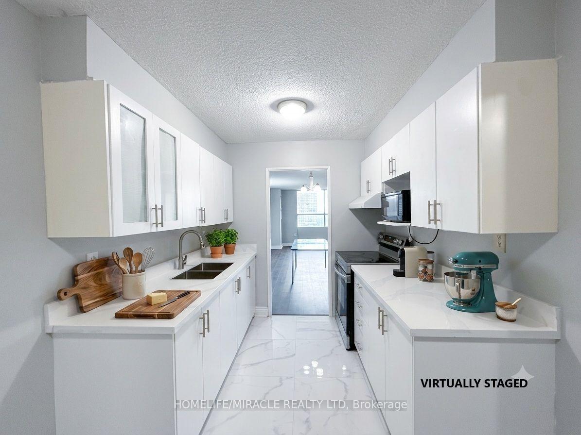 Photo 2 of Unit 807, 40 Panorama Court, Etobicoke, Mount Olive-Silverstone-Jamestown — HOMEH
