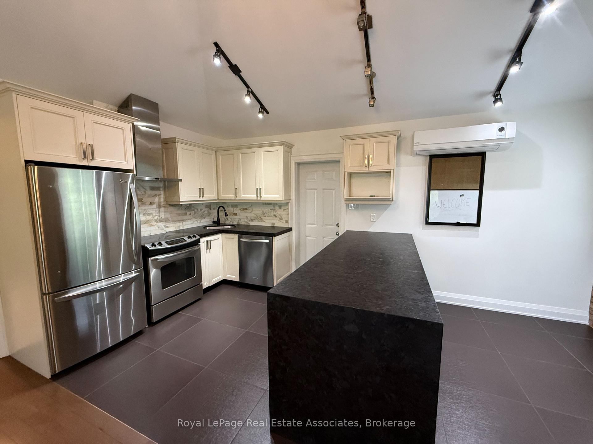 Photo 2 of Unit 4, 52 Cameron Avenue, Toronto, Keelesdale-Eglinton West — HOMEH