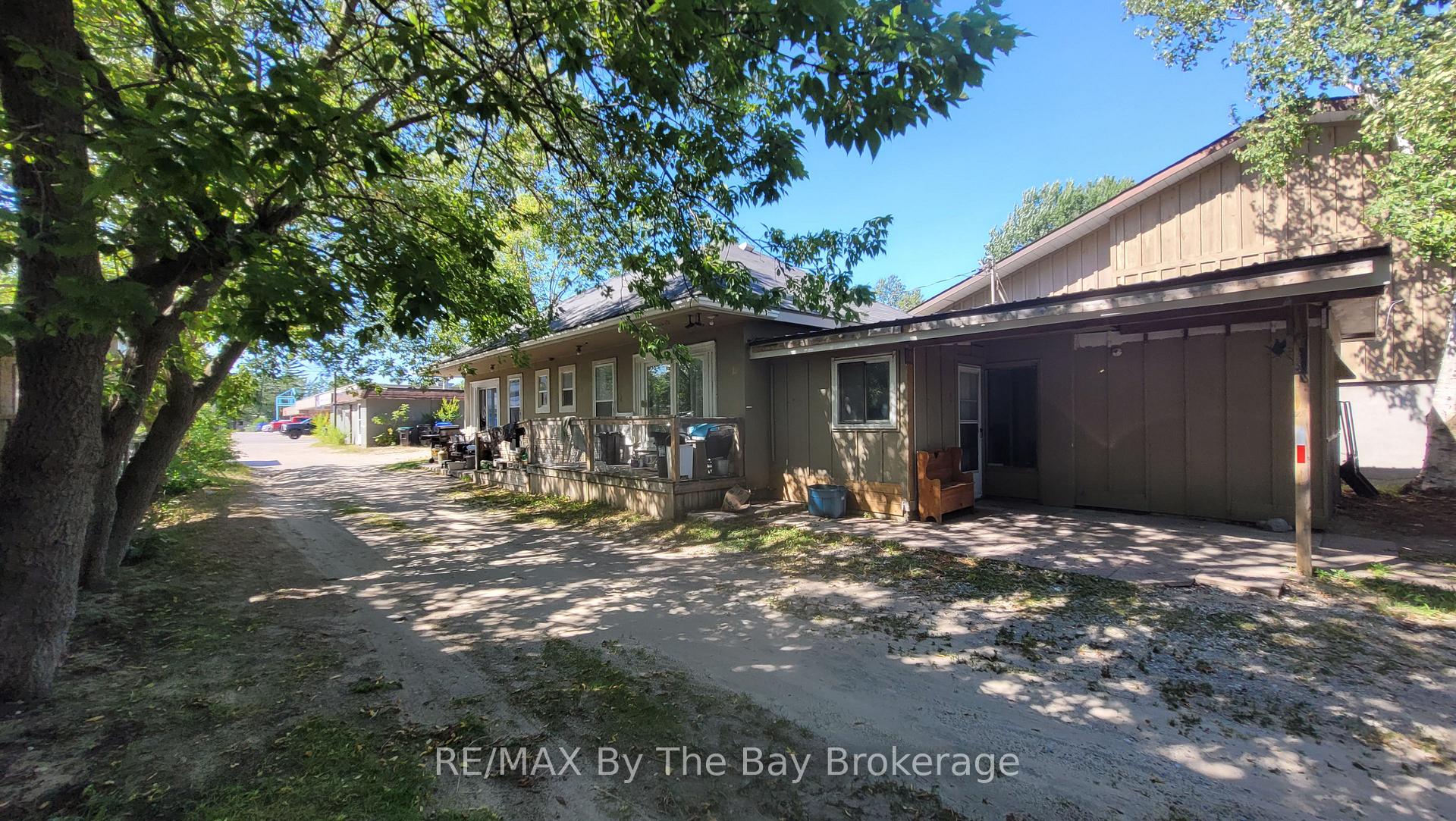 Photo 2 of Unit 3, 835 Mosley Street, Wasaga Beach — HOMEH