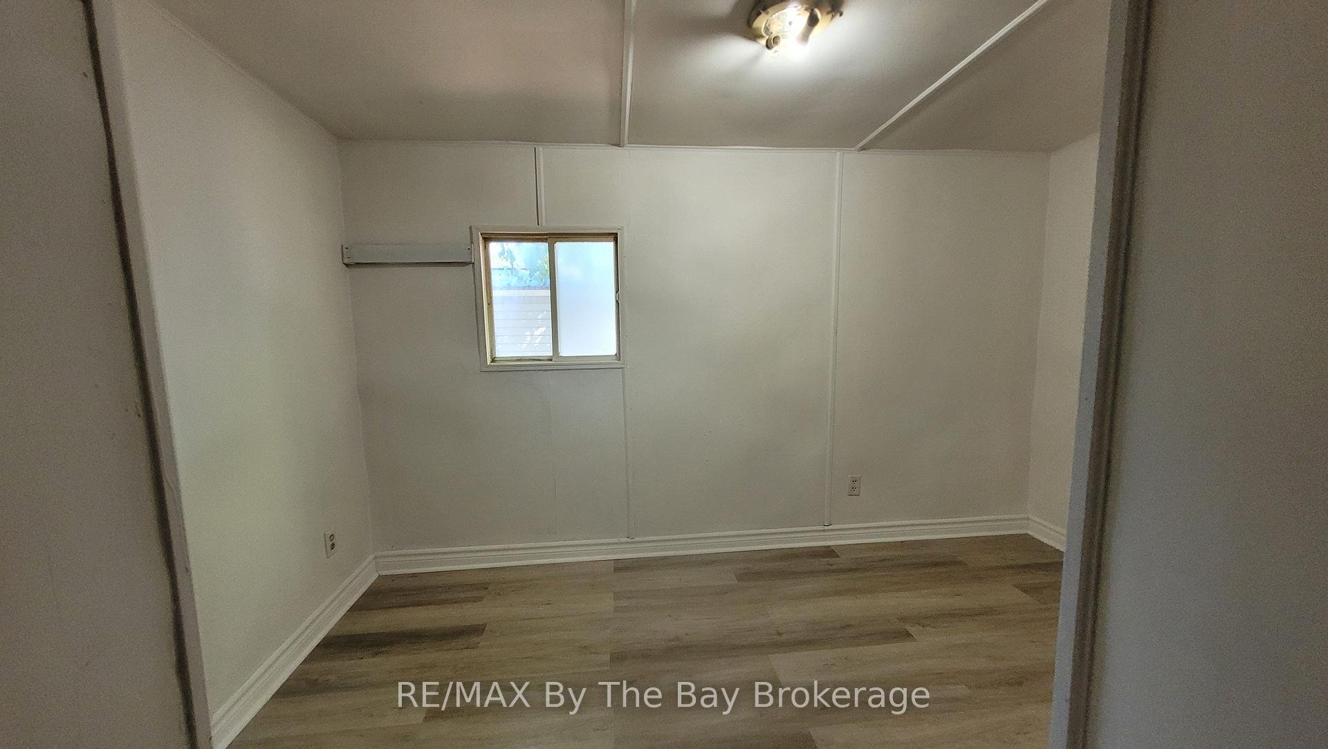 Photo 4 of Unit 3, 835 Mosley Street, Wasaga Beach — HOMEH