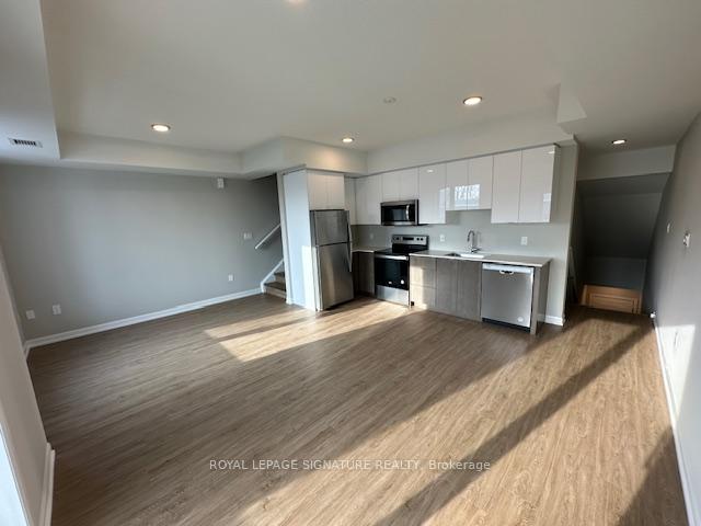 Front of Unit 205, 708 Woolwich Street
