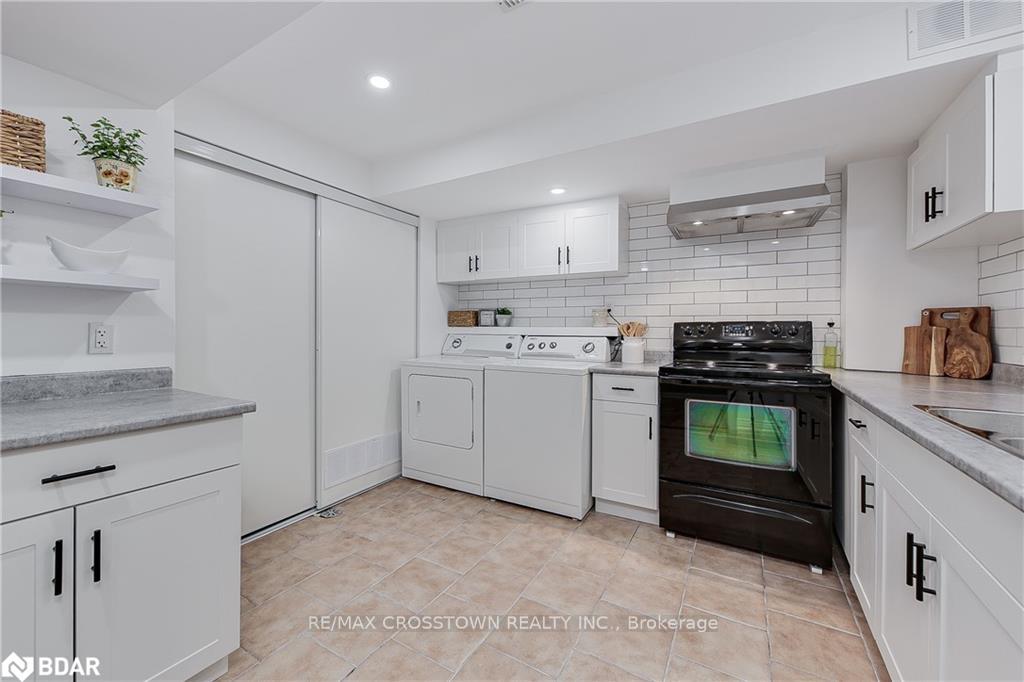 Photo 19 of Unit LOWER, 25 Charlemagne Avenue, Barrie, Innis-Shore — HOMEH