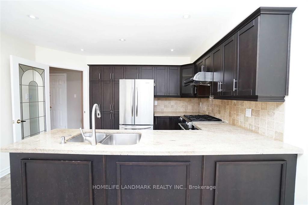 Photo 11 of 4887 Natkarni Crescent, Mississauga, East Credit — HOMEH
