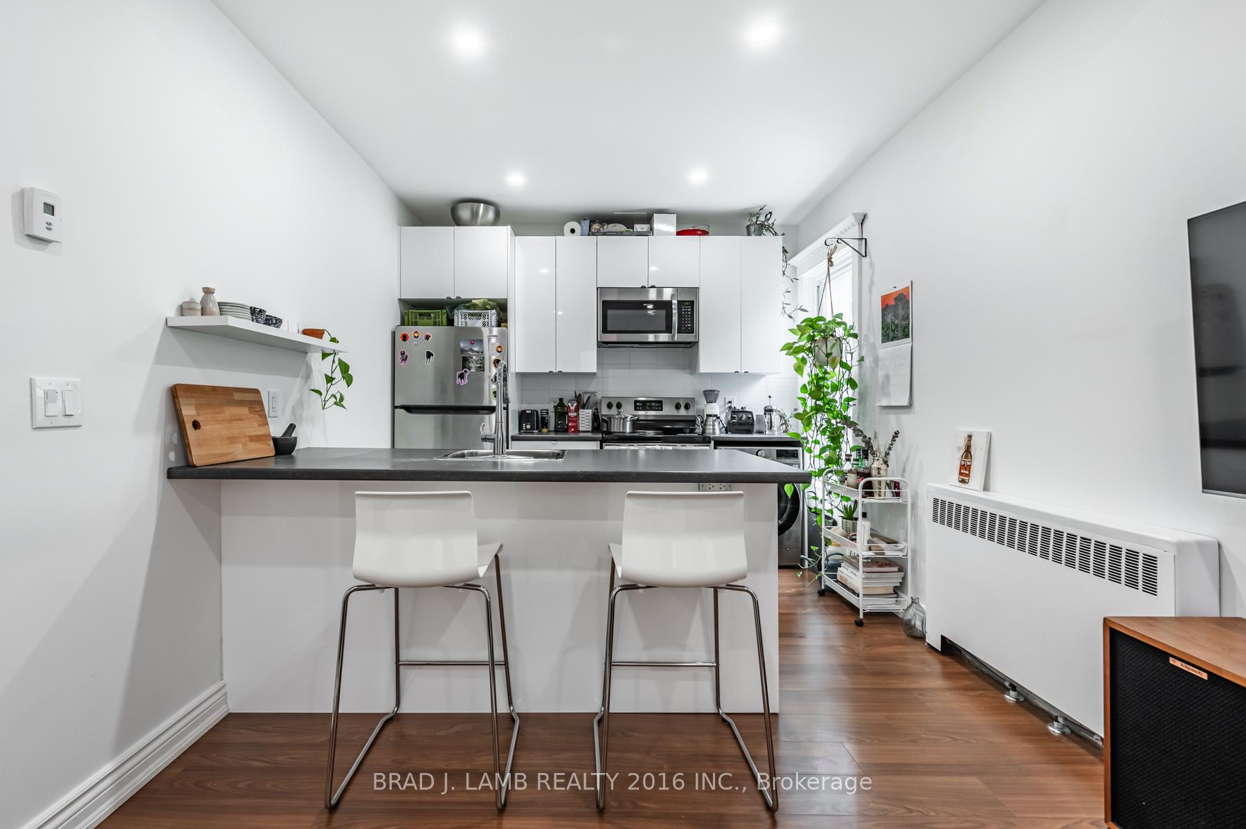 Photo 12 of Unit 4, 56 Wright Avenue, Toronto, Roncesvalles — HOMEH
