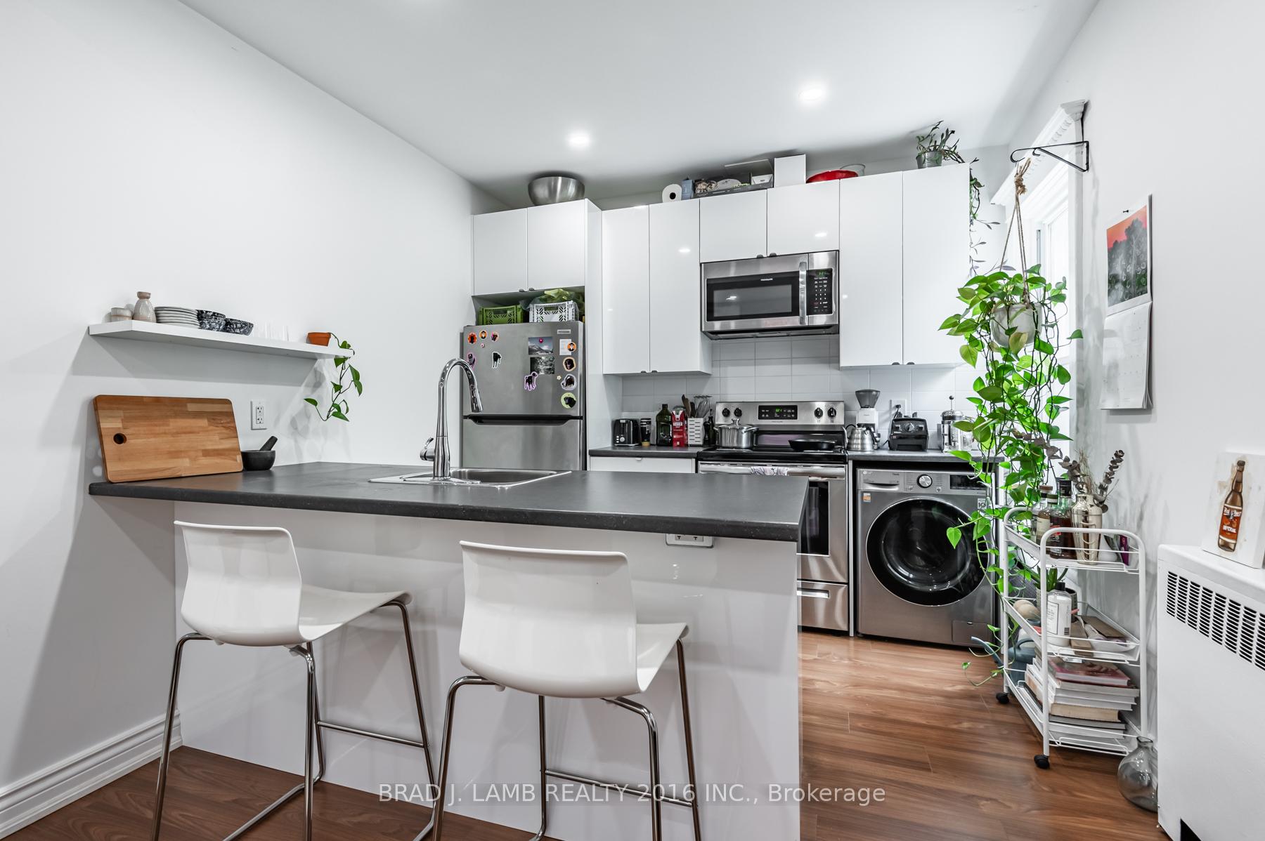 Photo 13 of Unit 4, 56 Wright Avenue, Toronto, Roncesvalles — HOMEH