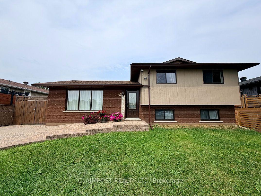 Photo 2 of 33 Algonquin Road, Cochrane — HOMEH