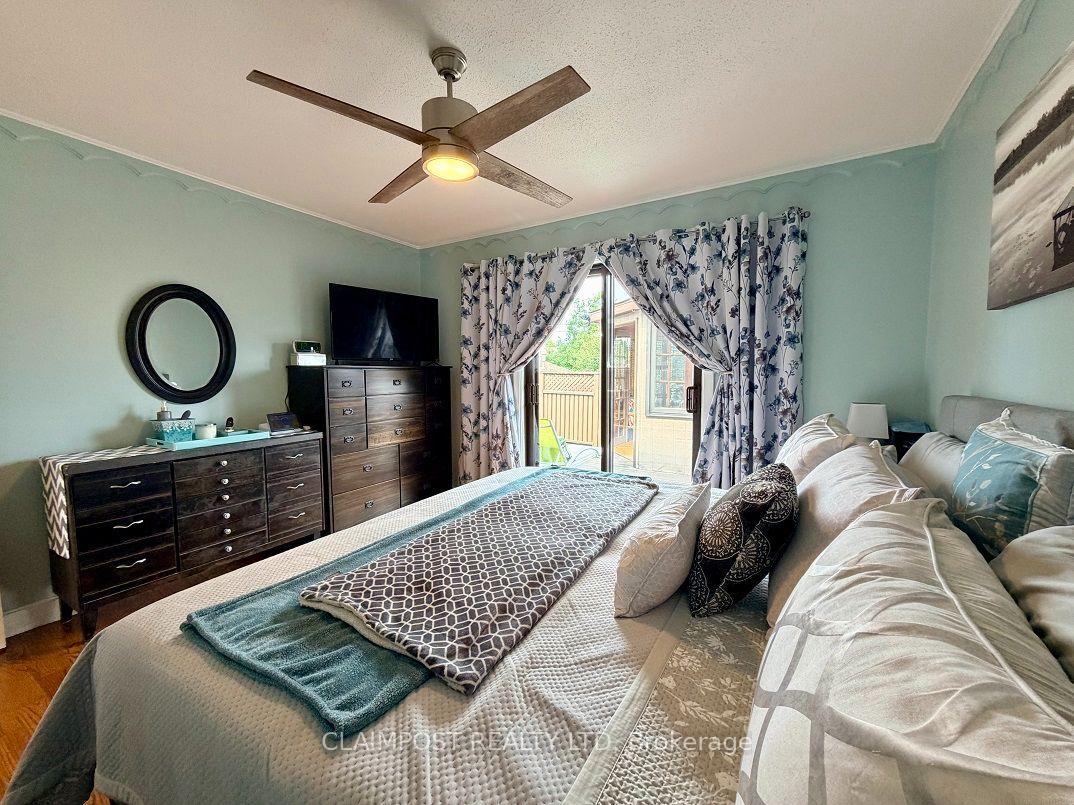 Photo 23 of 33 Algonquin Road, Cochrane — HOMEH