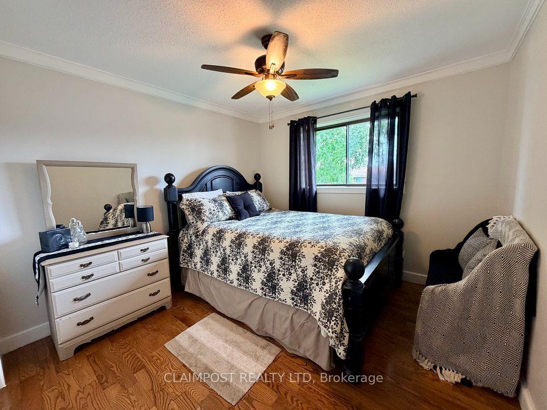 Photo 24 of 33 Algonquin Road, Cochrane — HOMEH