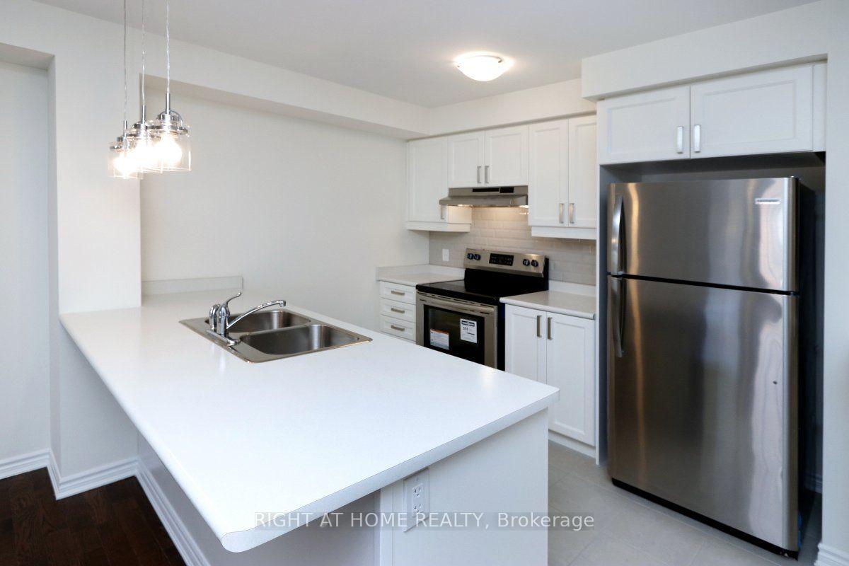 Photo 14 of Unit 115, 1000 Asleton Boulevard, Milton, Willmott — HOMEH