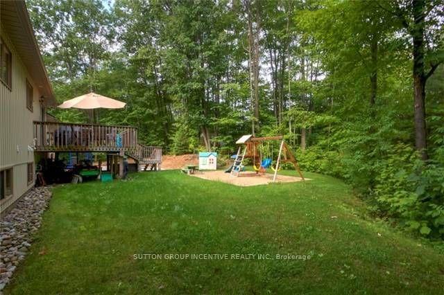 Photo 39 of 48 Tall Pines Drive, Tiny, Rural Tiny — HOMEH