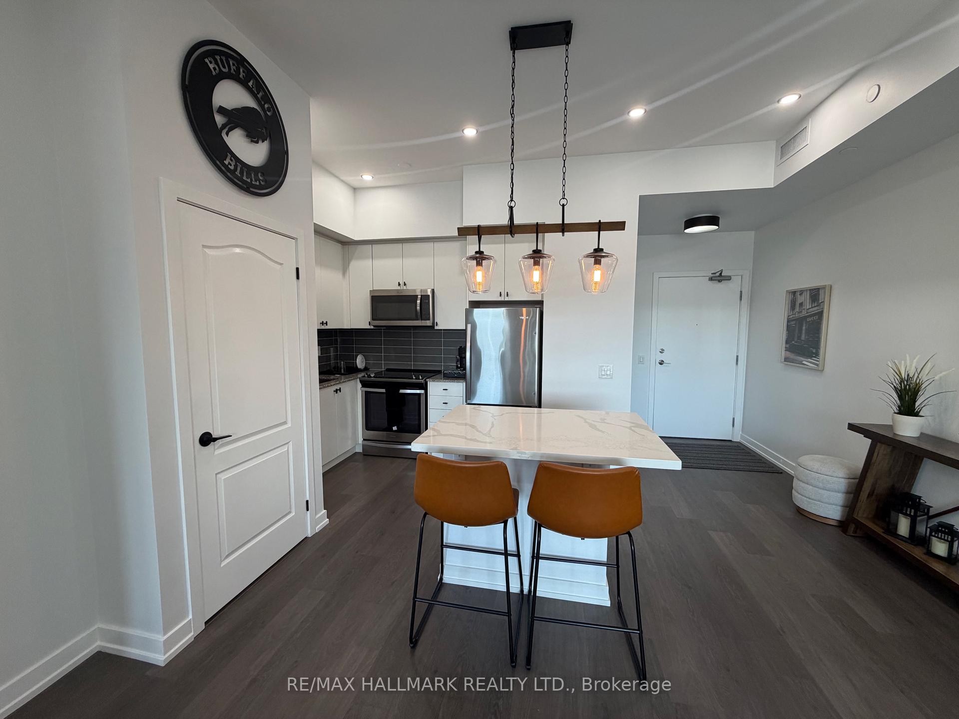 Photo 5 of Unit 404, 555 William Graham Drive, Aurora, Rural Aurora — HOMEH