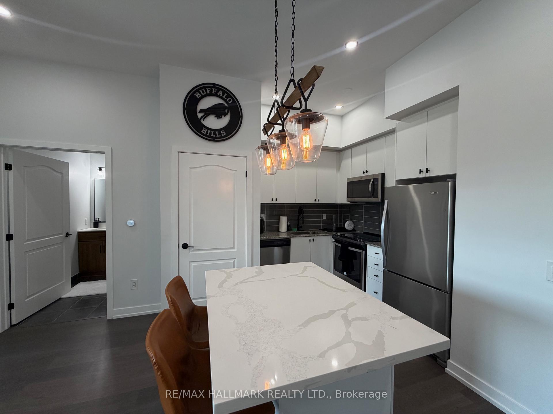 Photo 6 of Unit 404, 555 William Graham Drive, Aurora, Rural Aurora — HOMEH