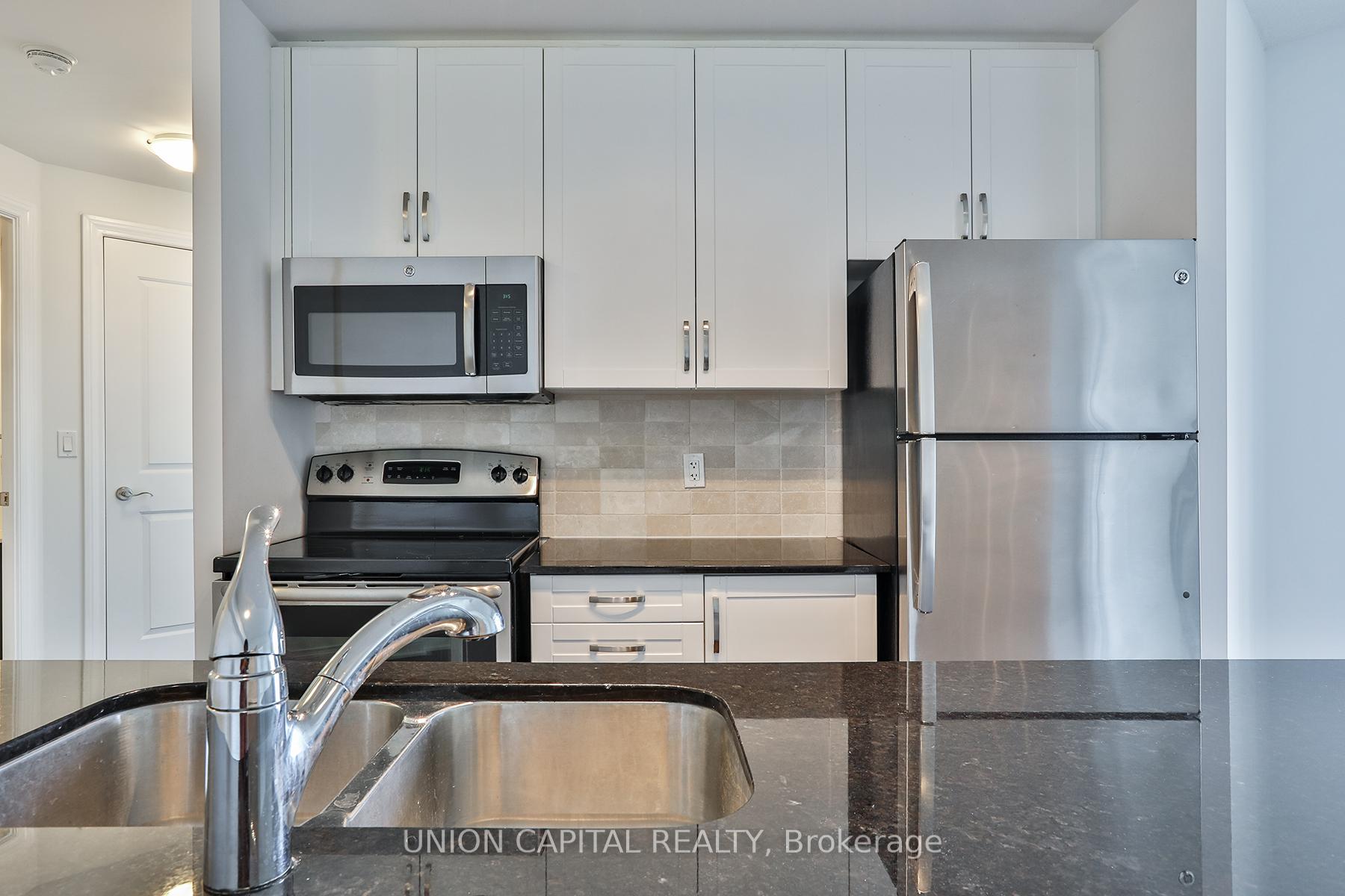 Photo 4 of Unit 511, 68 Main Street, Markham, Old Markham Village — HOMEH