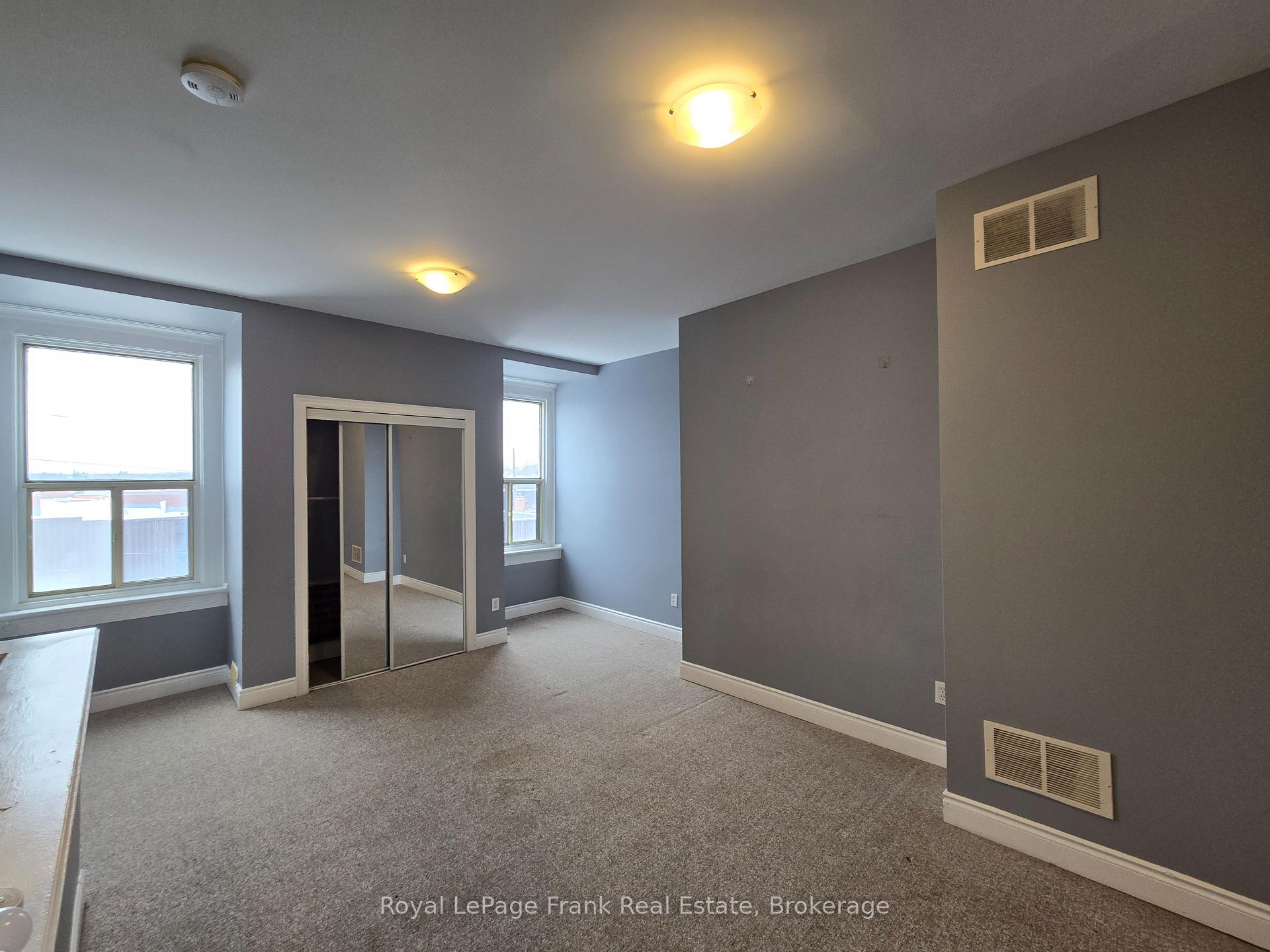 Photo 1 of Unit 208, 54 King Street E, Clarington, Bowmanville — HOMEH