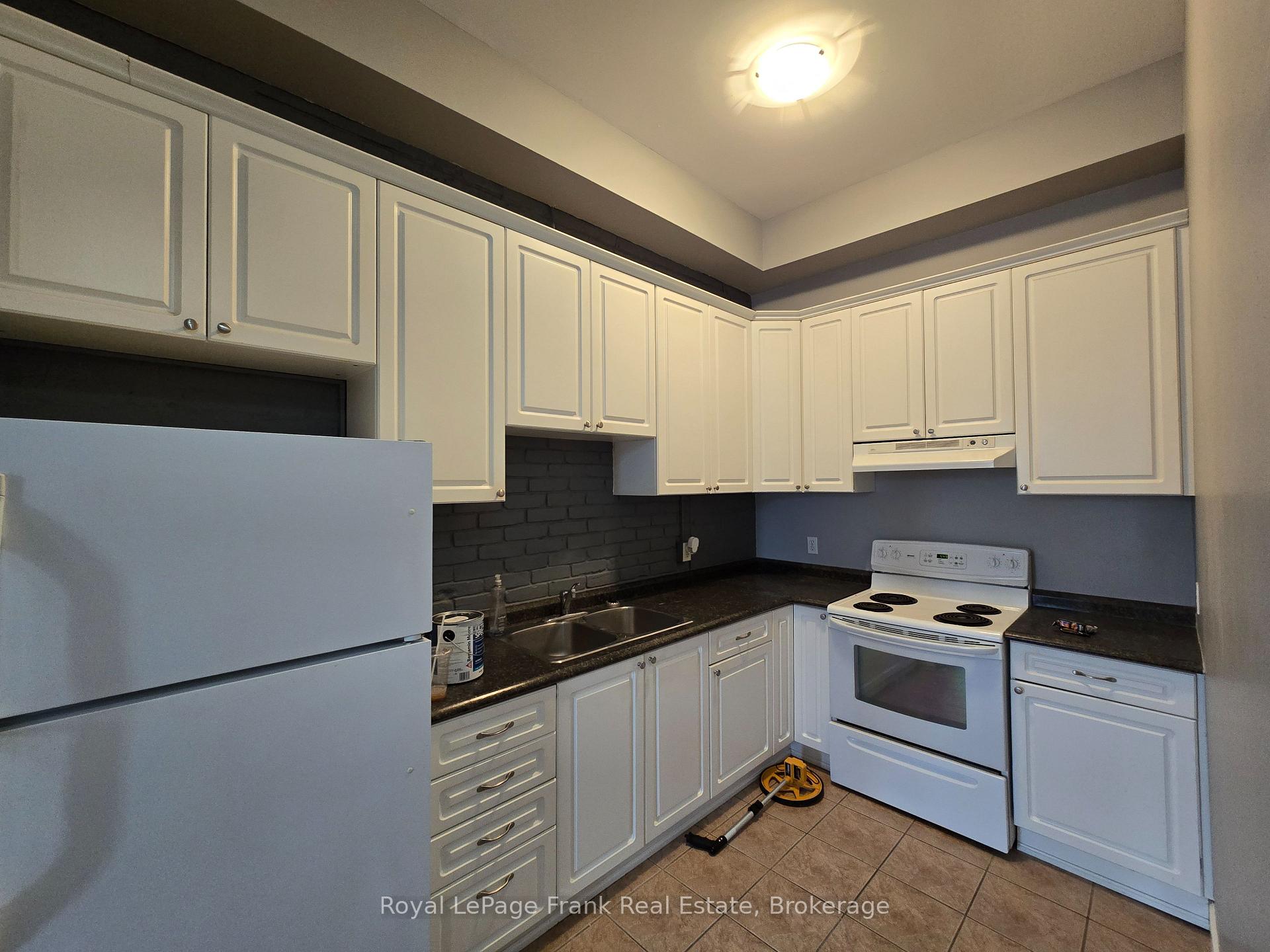 Photo 3 of Unit 208, 54 King Street E, Clarington, Bowmanville — HOMEH