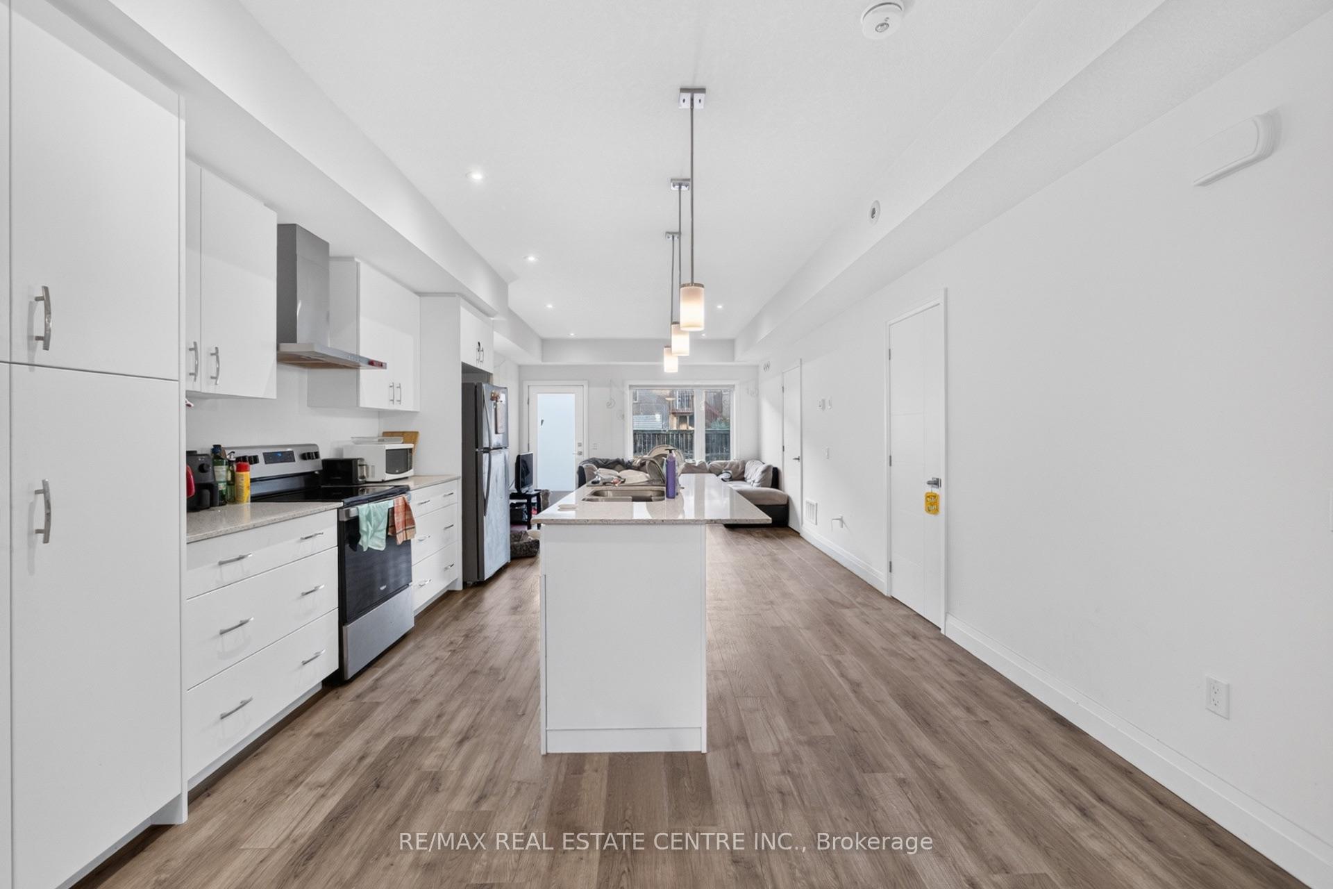 Photo 7 of 34 Lily Lane, Guelph, Clairfields/Hanlon Business Park — HOMEH