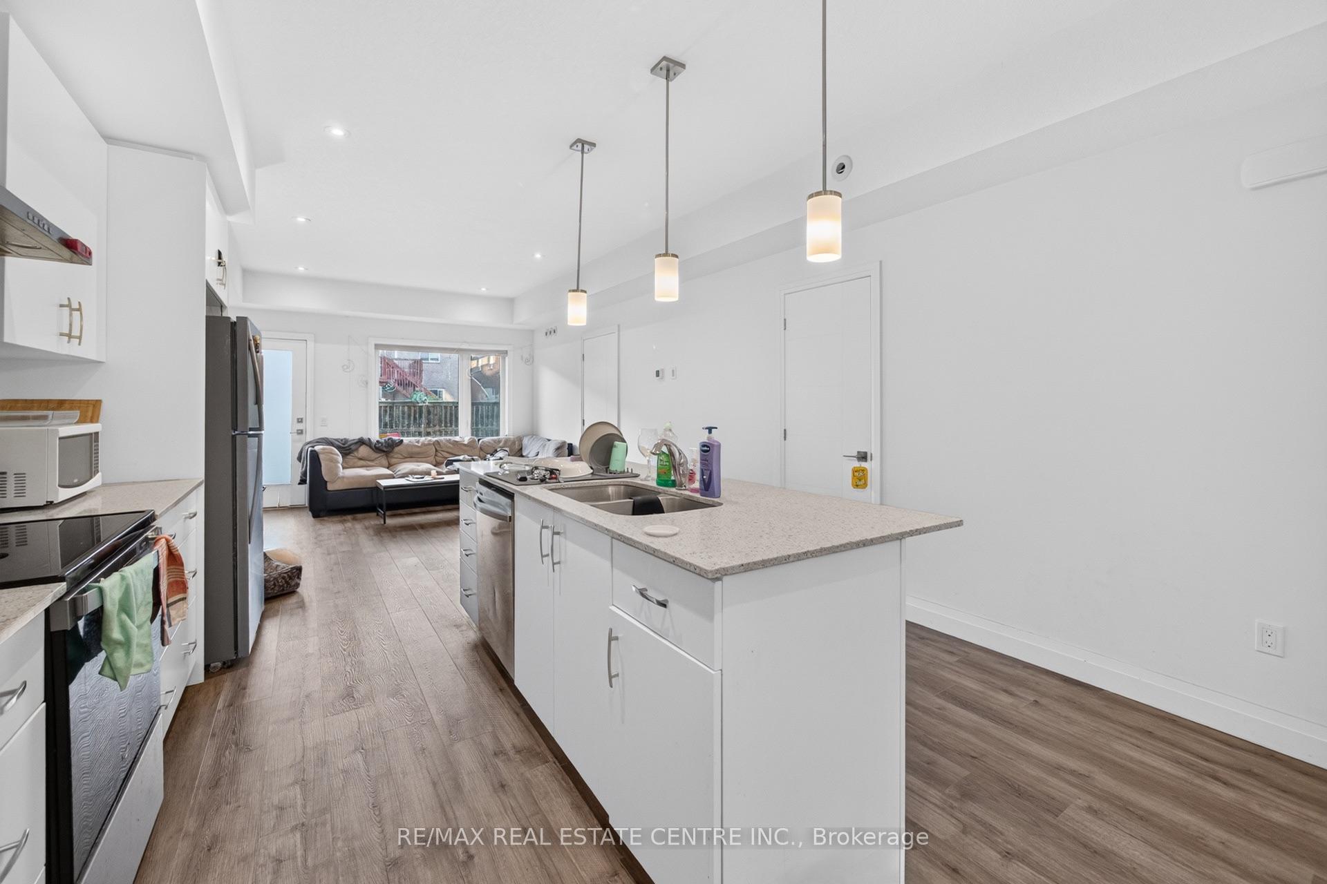 Photo 10 of 34 Lily Lane, Guelph, Clairfields/Hanlon Business Park — HOMEH