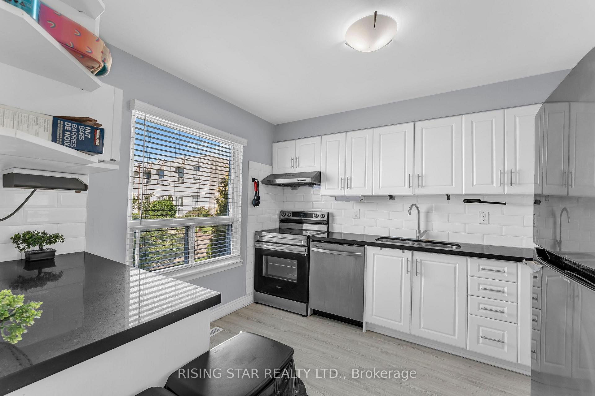 Photo 2 of Unit 2, 7440 Goreway Drive, Mississauga, Malton — HOMEH