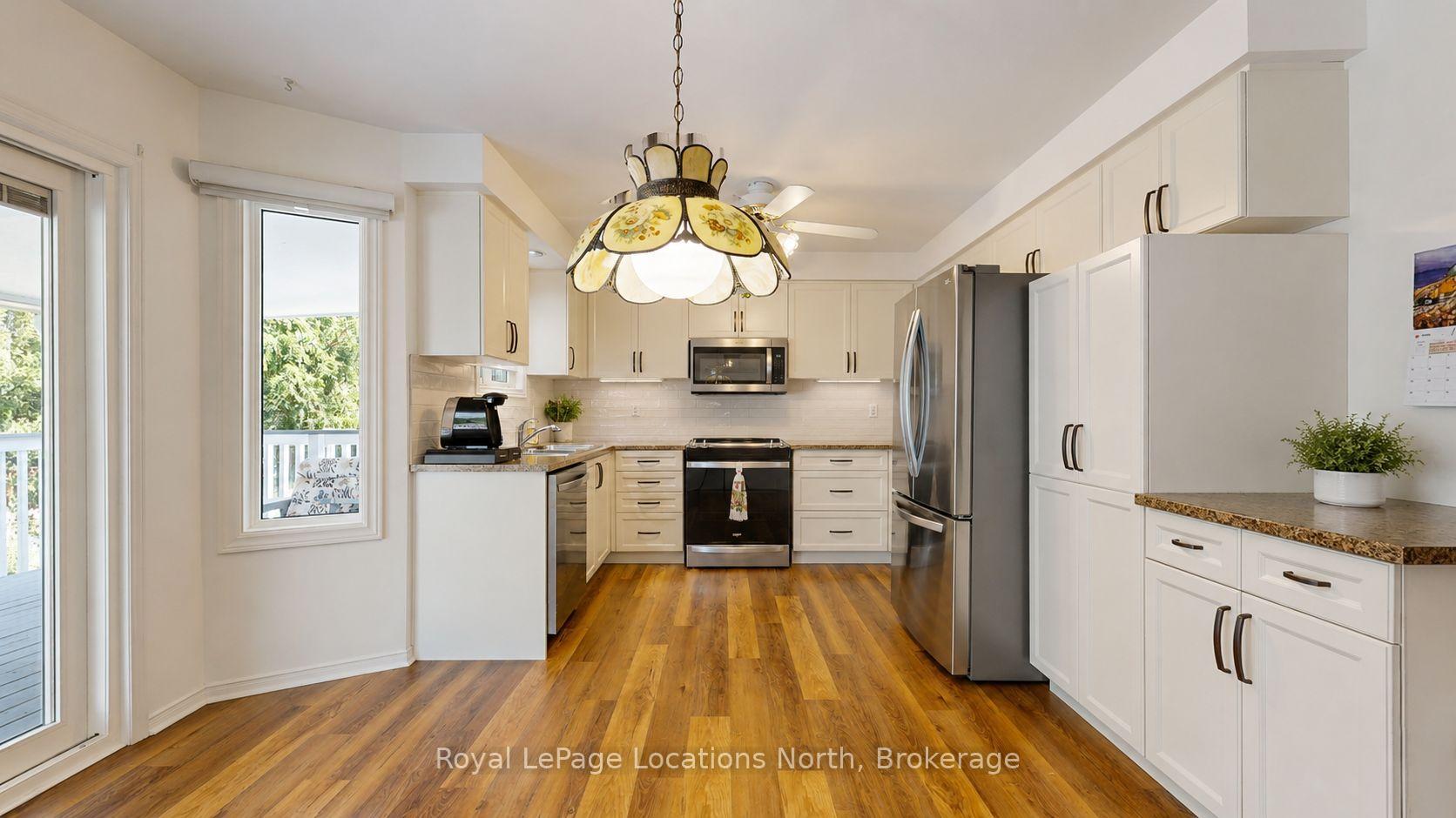 Photo 6 of 63 Glen Eton Road, Wasaga Beach — HOMEH