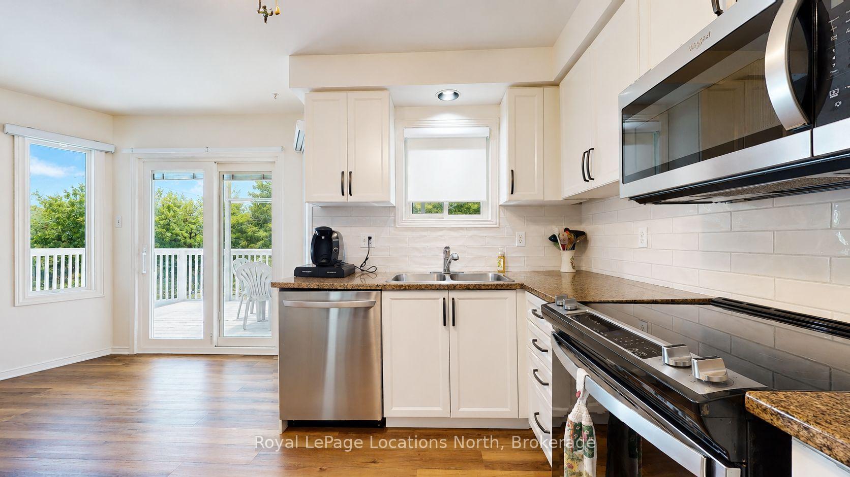 Photo 7 of 63 Glen Eton Road, Wasaga Beach — HOMEH