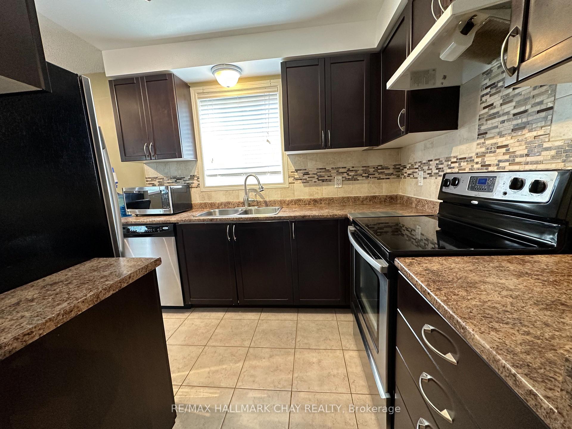 Photo 4 of 54 William Paddison Drive, Barrie, Georgian Drive — HOMEH