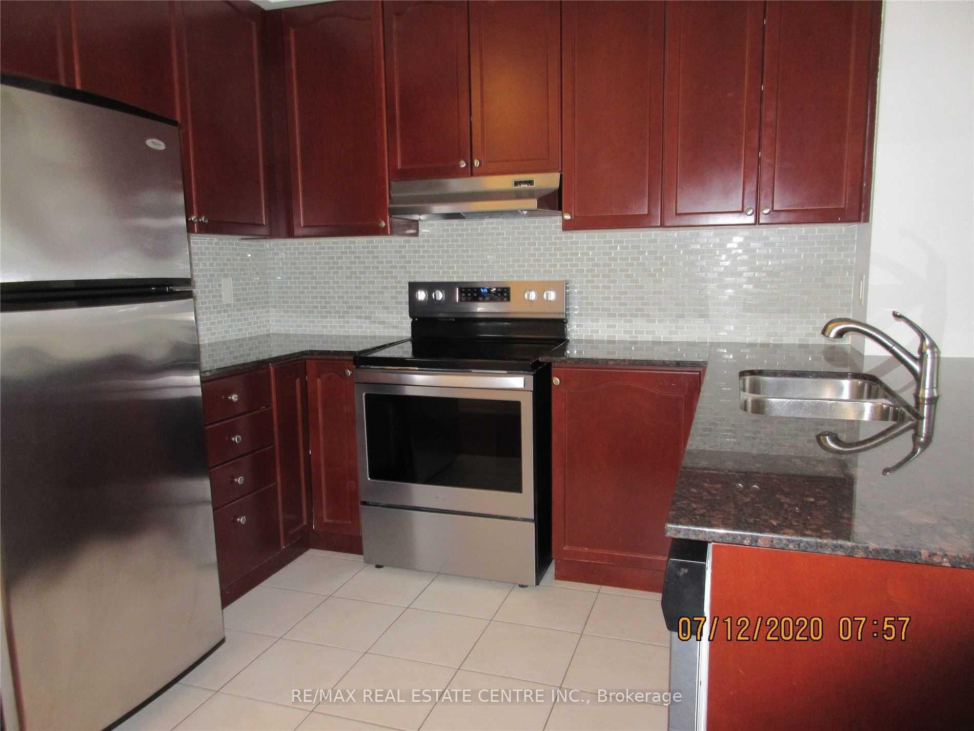 Photo 5 of Unit TH#111, 220 Forum Drive, Mississauga, Hurontario — HOMEH