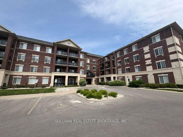 Photo 1 of Unit 104, 308 Watson Parkway N, Guelph, Grange Road — HOMEH