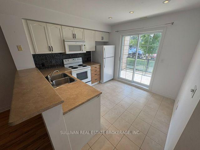 Photo 7 of Unit 104, 308 Watson Parkway N, Guelph, Grange Road — HOMEH