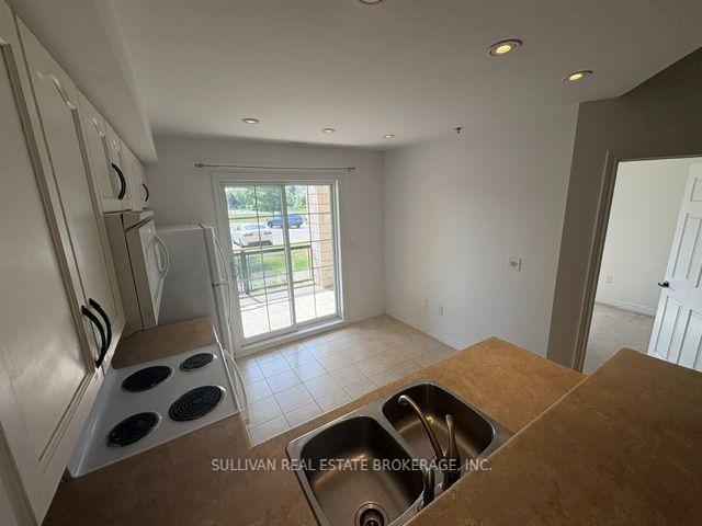 Photo 9 of Unit 104, 308 Watson Parkway N, Guelph, Grange Road — HOMEH