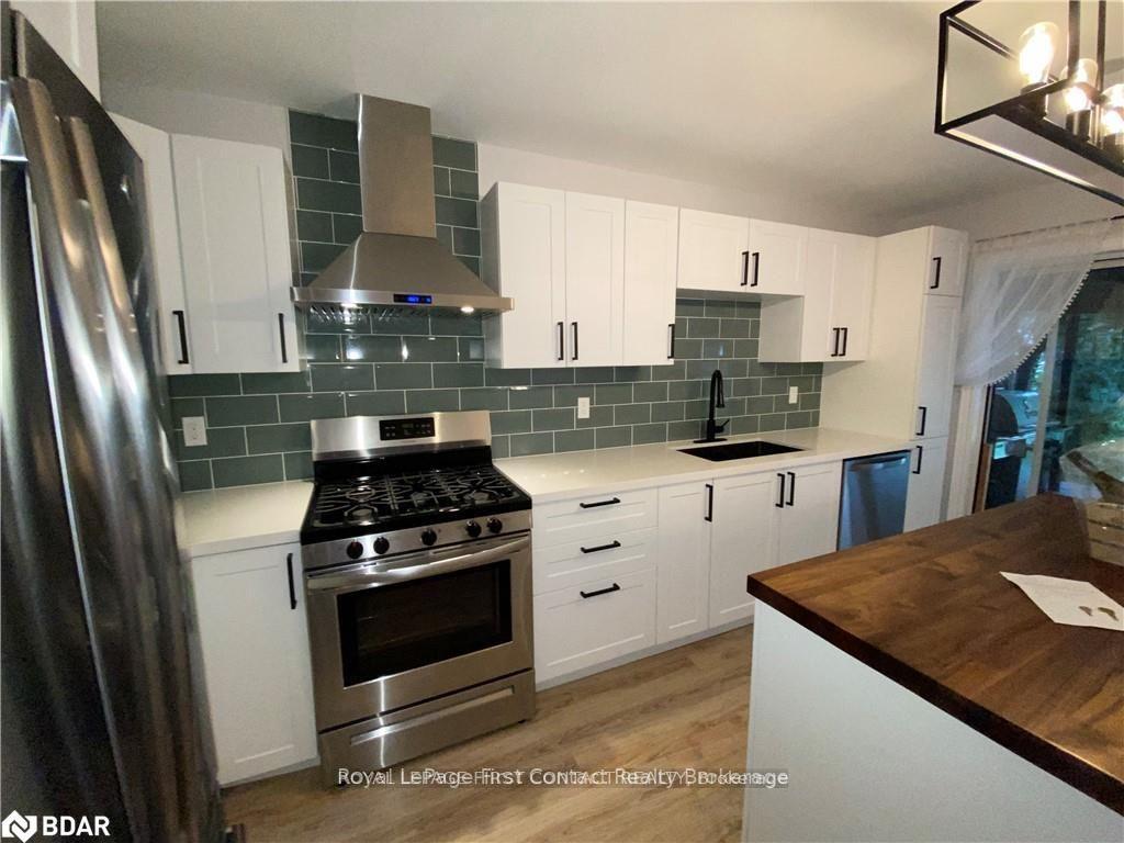Photo 4 of 41 Copeman Crescent, Barrie, Painswick North — HOMEH