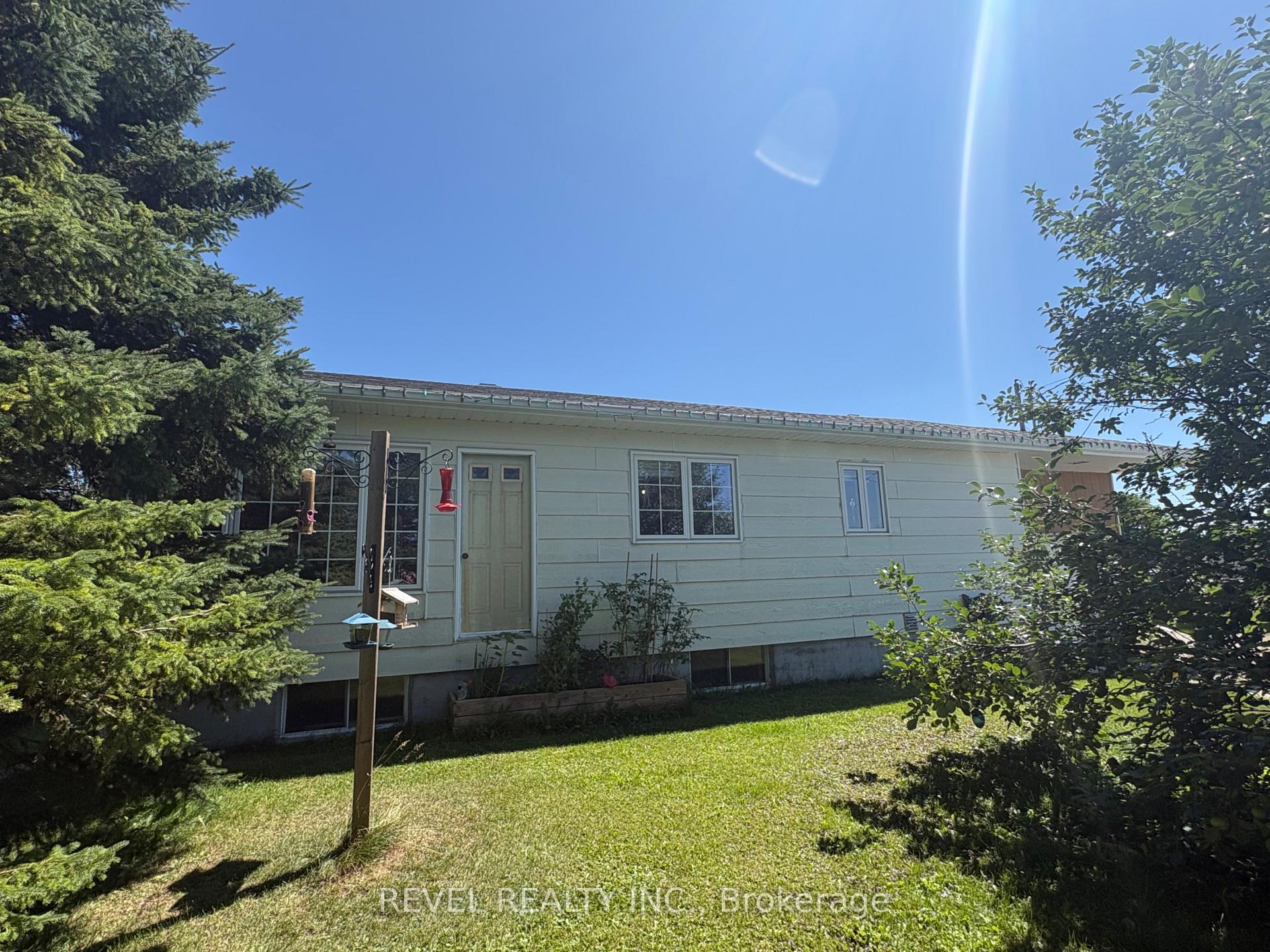 Photo 2 of 364 Genier Road, Cochrane — HOMEH