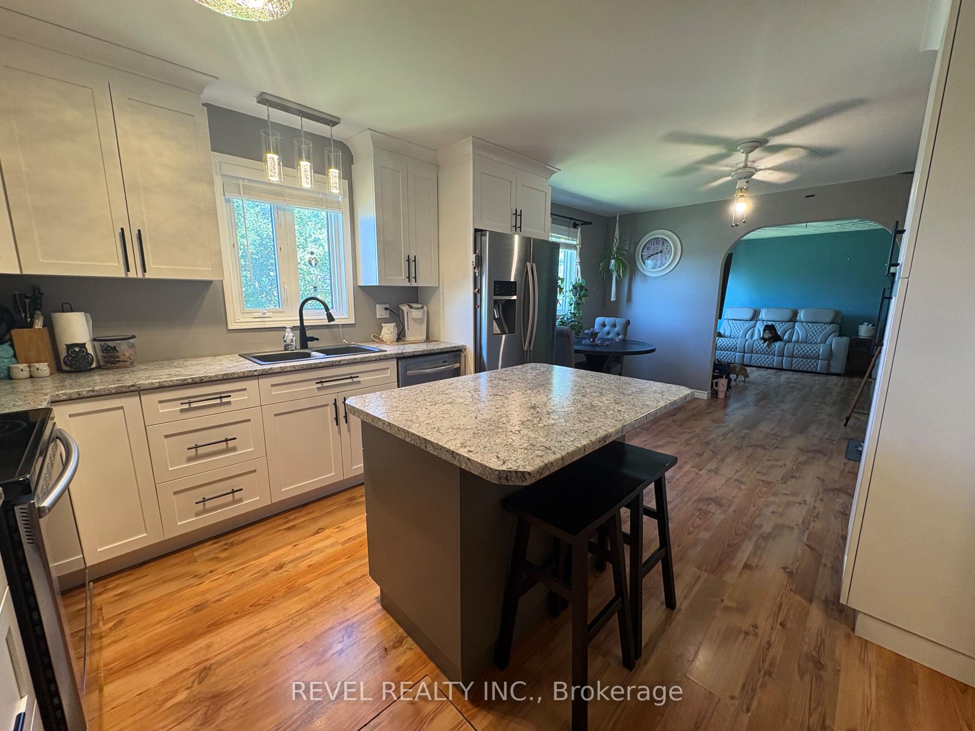 Photo 6 of 364 Genier Road, Cochrane — HOMEH