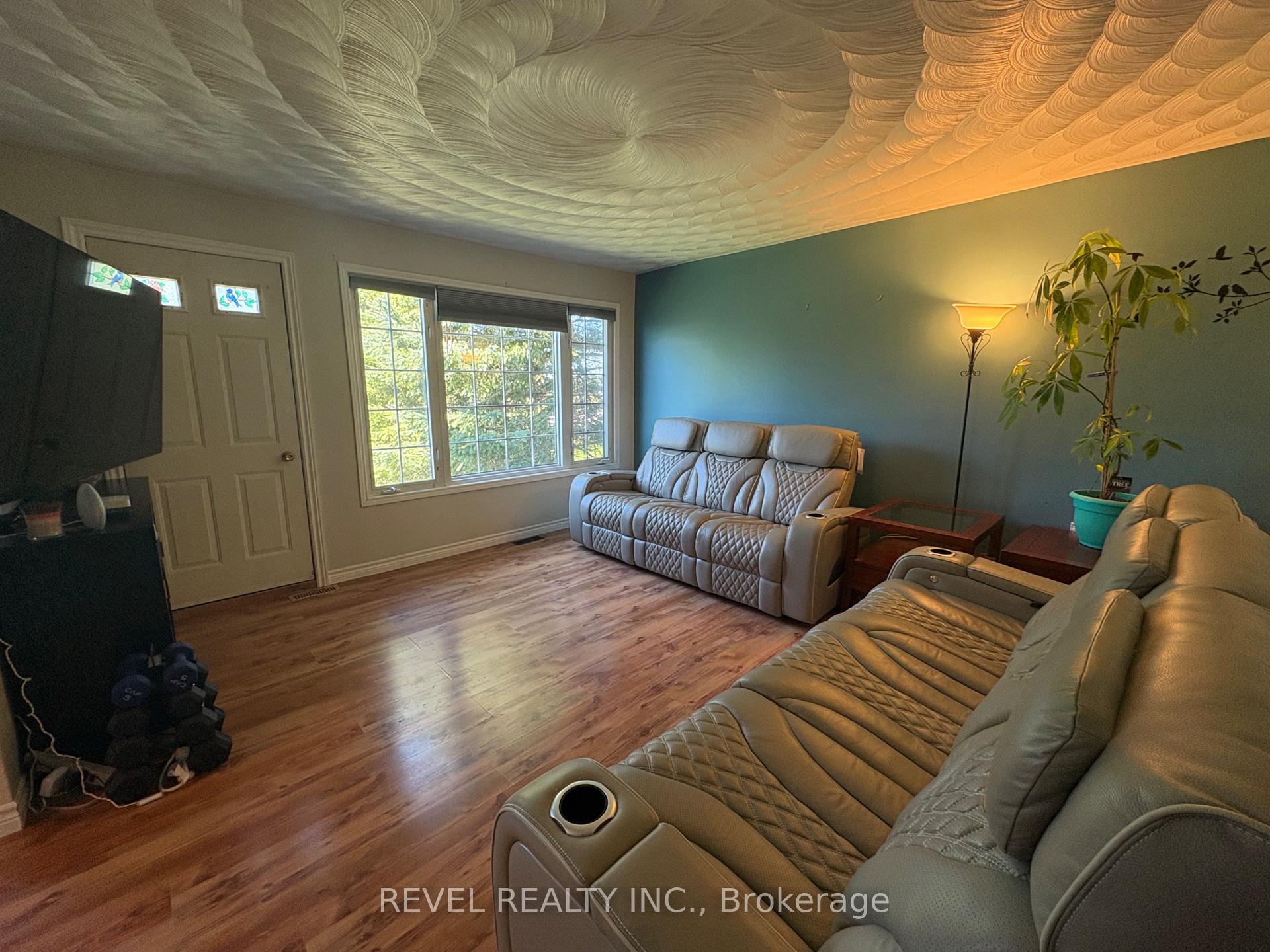 Photo 10 of 364 Genier Road, Cochrane — HOMEH